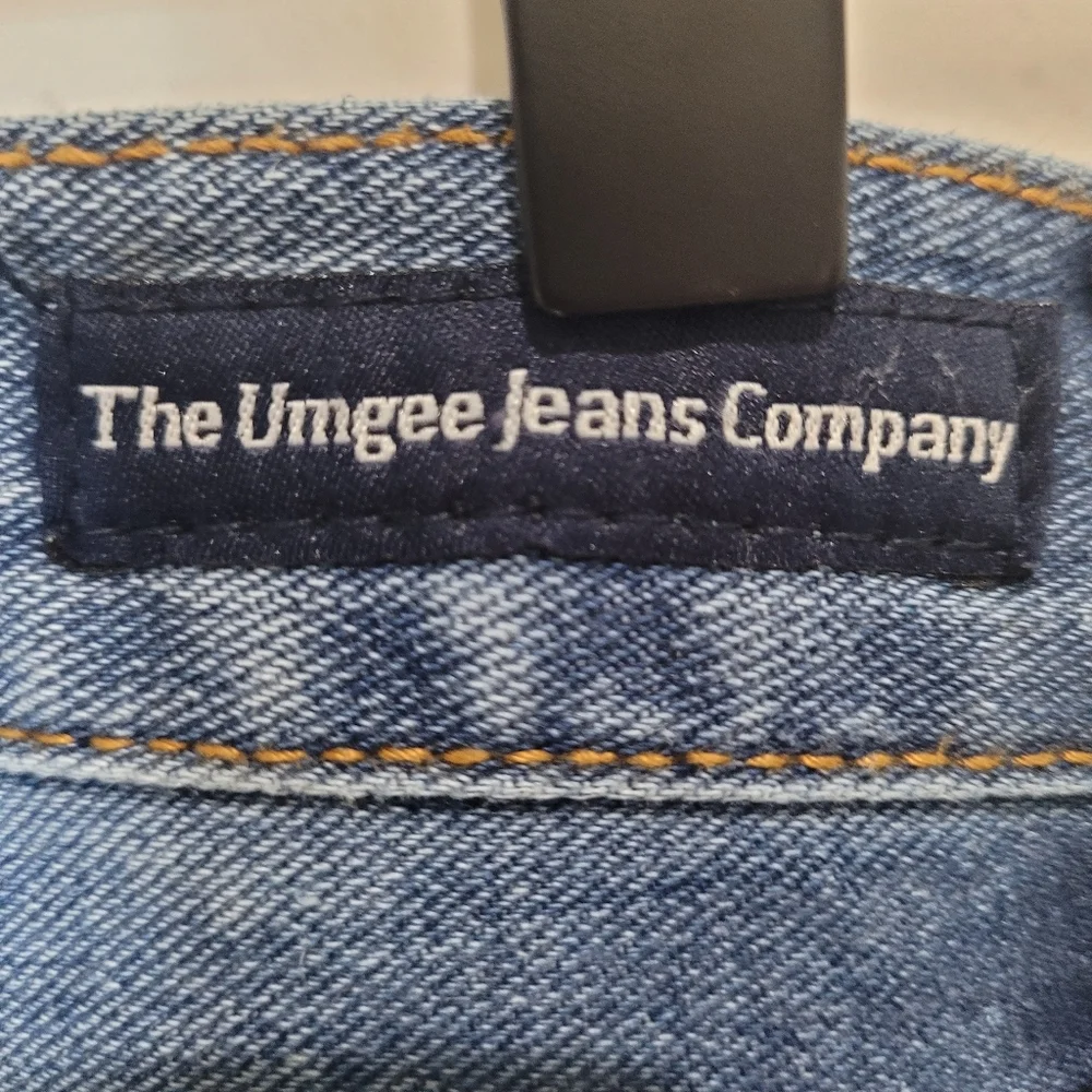 Umgee distressed Button Fly Jeans Size 28‎